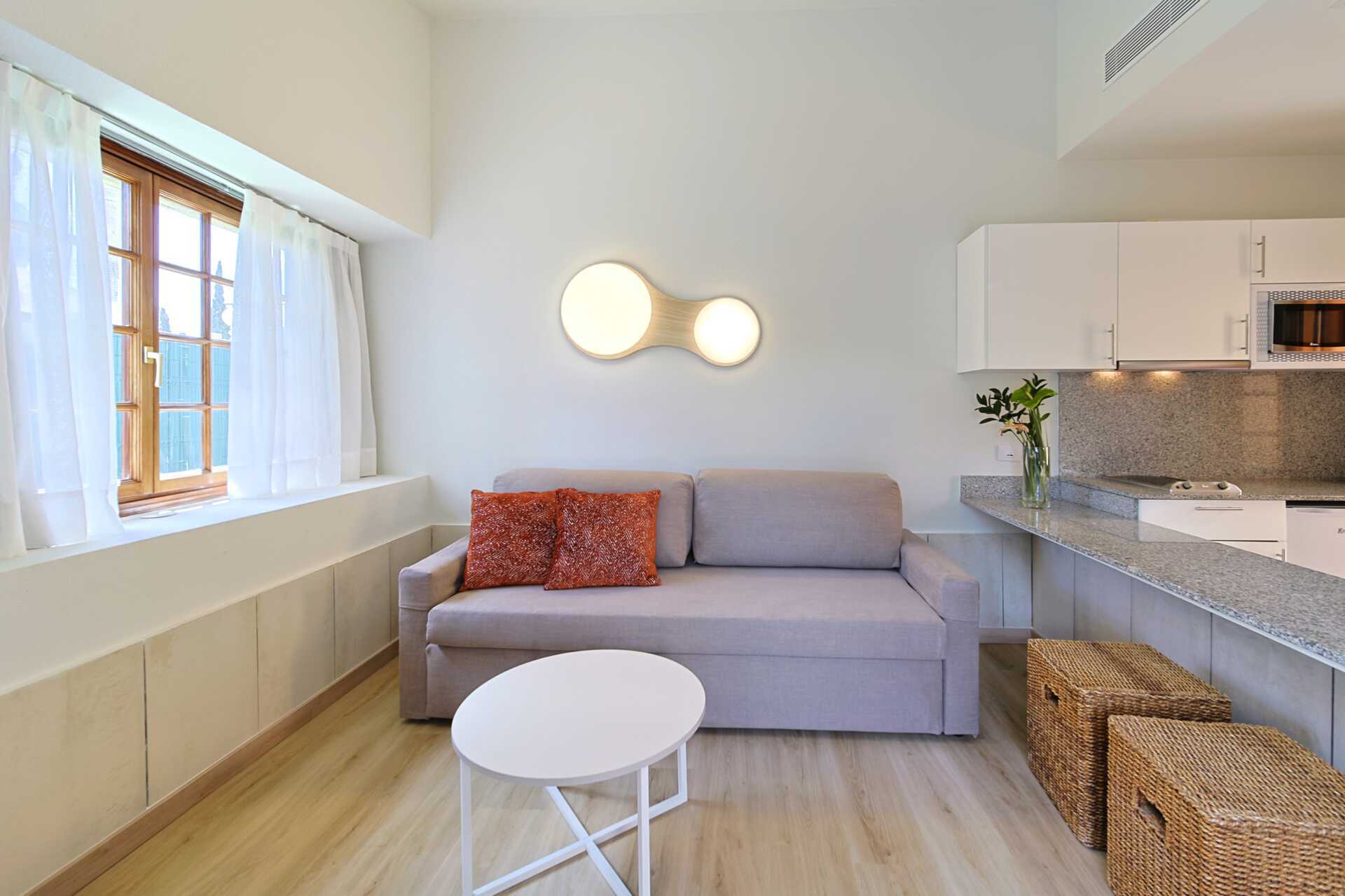 Billedet er en illustration af, hvordan de renoverede lejligheder kommer til at se ud.