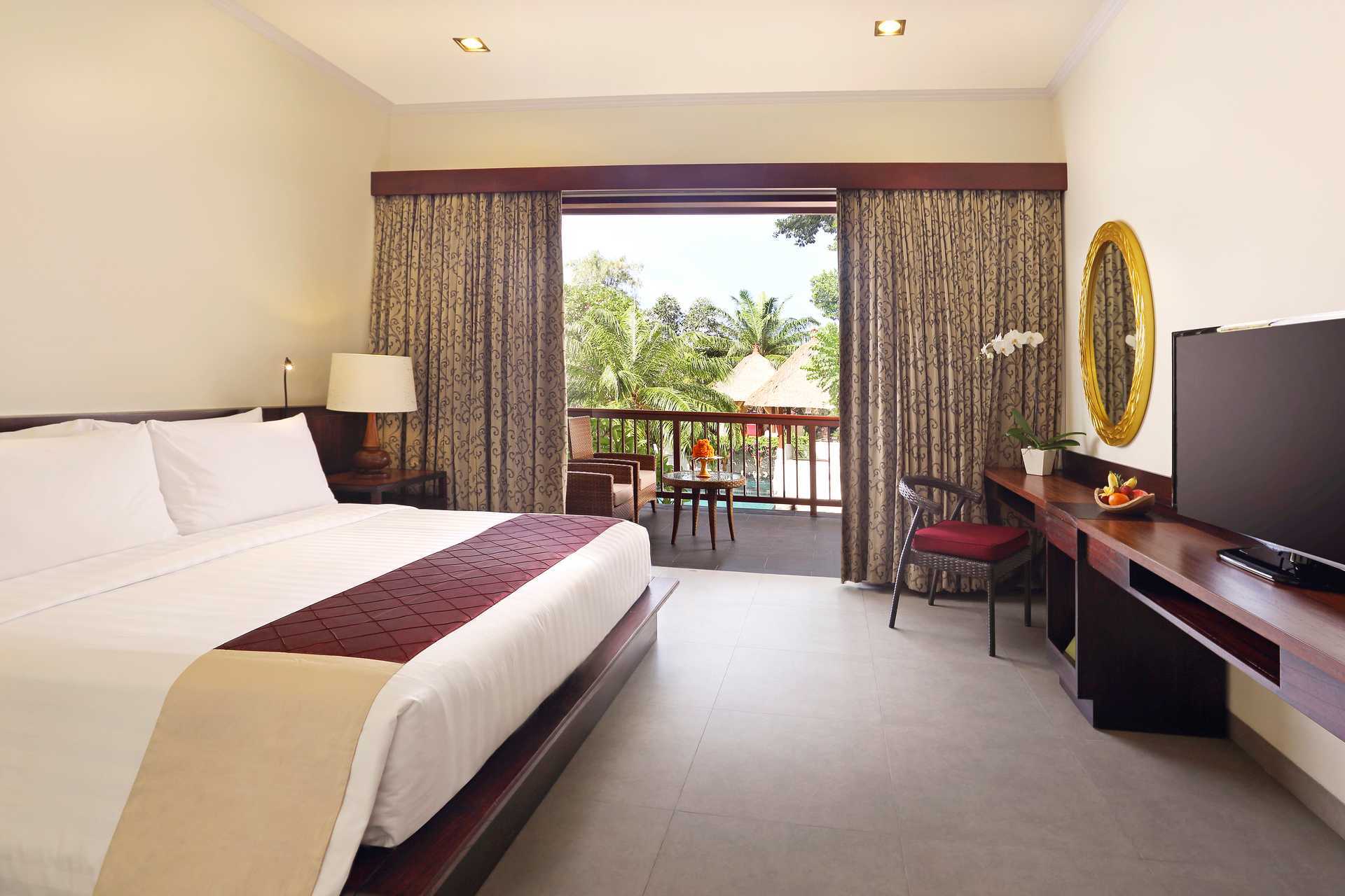 Deluxe-værelse på hotel Griya Santrian i Sanur, Bali.