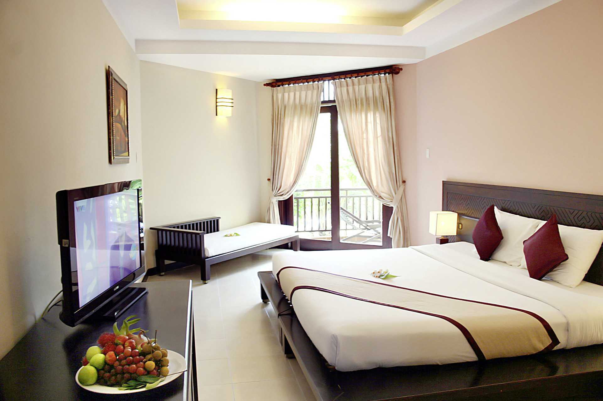 Deluxe-værelse på hotel Romana Beach Resort i Phan Thiet, Vietnam.