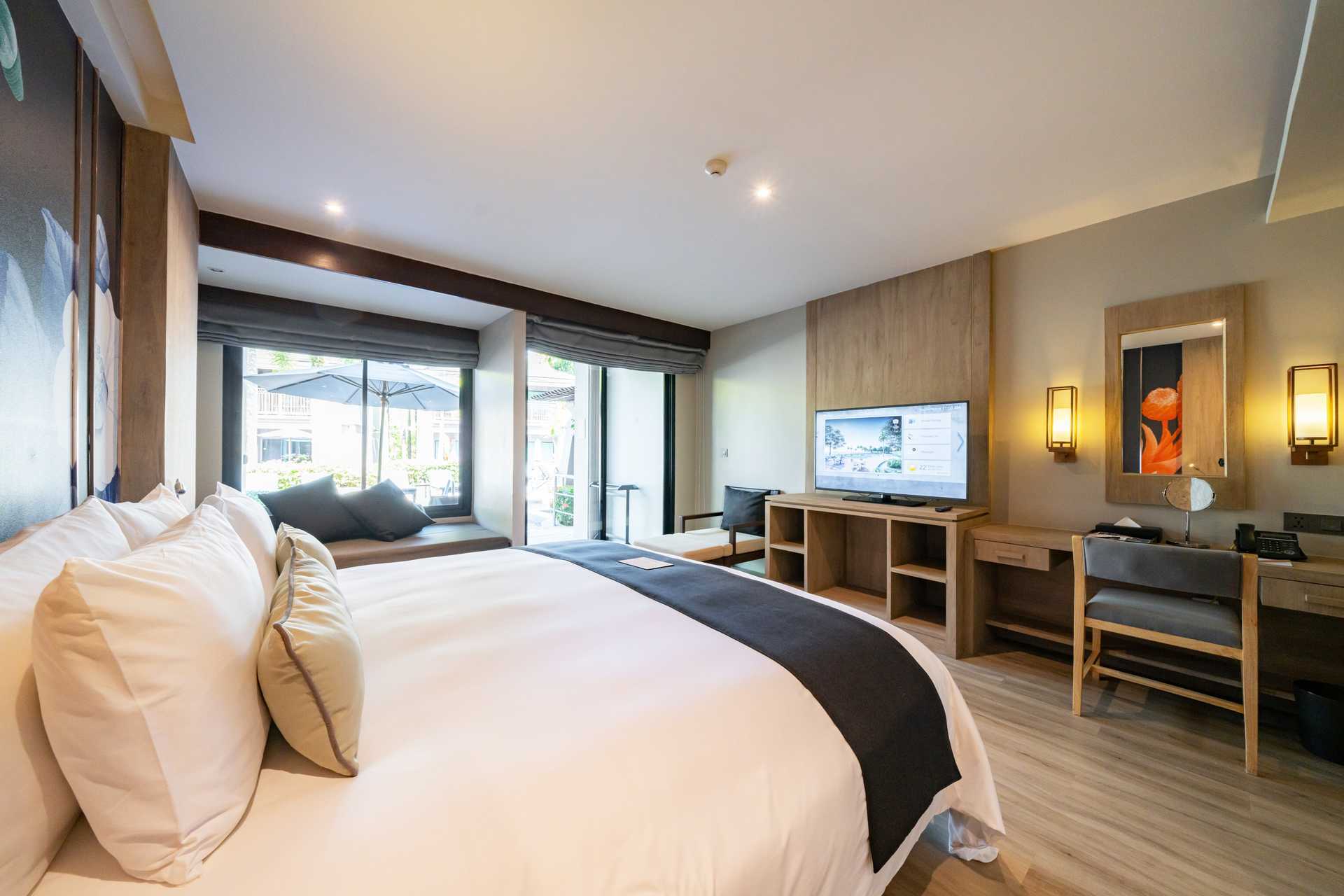 Dobbeltværelse med delt pool på La Flora Khao Lak i Khao Lak, Thailand.