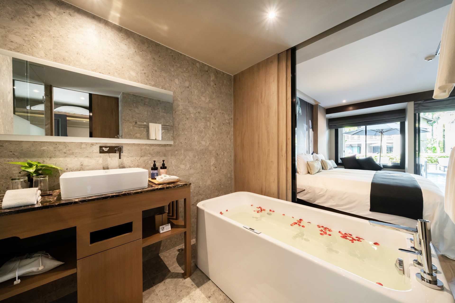 Dobbeltværelse med delt pool på La Flora Khao Lak i Khao Lak, Thailand.