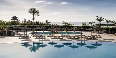 Poolområdet på Hotel Sheraton Fuerteventura Beach, Golf & Spa Resort på Fuerteventura, De Kanariske Øer, Spanien.