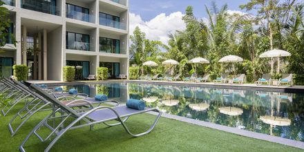 Poolområde på Hotel The Waters Khao Lak by Katathani i Thailand.